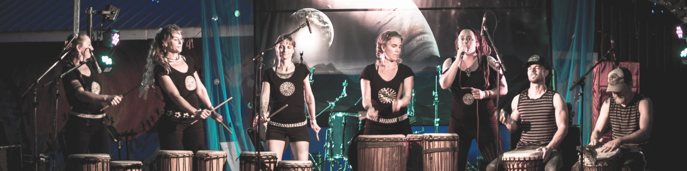 Group of women on stage playing live music